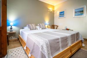 a bedroom with a large bed in a room at Villa de luxe Sakina in Essaouira