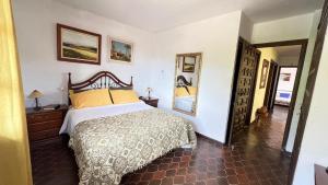 a bedroom with a bed in a room at Drago Luxury Villa in Tarragona +11 photos