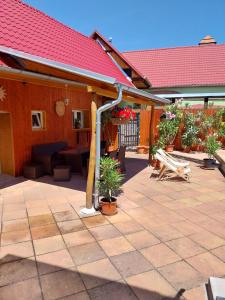 a patio with a roof with a gazebo at Apartmán u Šmídů in Jaroslavice