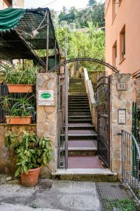 a set of stairs leading up to a building at Albergo Al Carugio in Monterosso al Mare