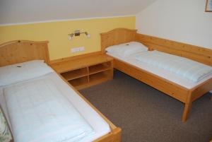 Letto o letti in una camera di Appartement Zweikofelblick