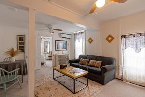 a living room with a couch and a table at The Woodbine Inn in Palenville