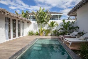 a swimming pool in the backyard of a villa at Preabeach Boutique Hotel & SPA in Prea