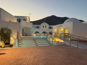 a building with stairs in front of it at Antoperla Luxury Hotel & Spa - featuring the New Antoperla Adults Only Wing in Perissa