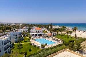 an aerial view of a resort with a swimming pool and the beach at Stella Maris in Kos