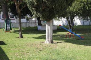 Plac zabaw dla dzieci w obiekcie Bonanza Apartment