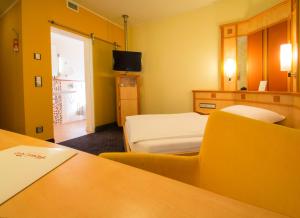 Postel nebo postele na pokoji v ubytování Hotel Rio