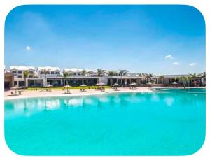 a large pool with blue water in a resort at Aurevia Properties in Pretoria