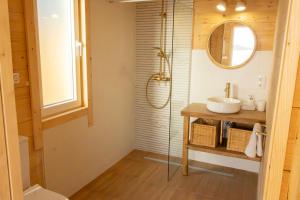a bathroom with a sink and a shower at Raíces da Costa Ártabra in Islote Mouron +30 photos