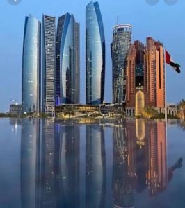 a group of tall buildings in a city at Holiday Abu Dhabi in Abu Dhabi