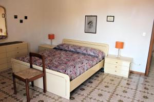 Posteľ alebo postele v izbe v ubytovaní Appartamenti Giulia