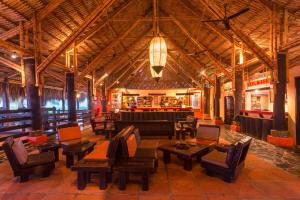 a large room with chairs and tables in a building at Decameron Panaca - All Inclusive in Quimbaya +16 photos