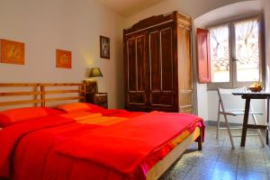 Postel nebo postele na pokoji v ubytování Guesthouse Bosa di Giuseppe