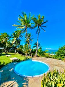 Piscina de la sau aproape de Coco Pontall Bangalôs