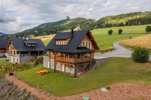 an overhead view of a large house with a driveway at Roubenka Pod Oblohou in Dolní Morava