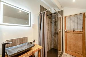 a bathroom with a shower and a sink at 3 Bed in Bideford oc-79552 in Bideford +38 photos