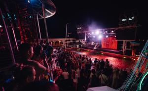 a crowd of people standing in front of a stage at Arkadia Beach Hotel in Odesa +163 photos