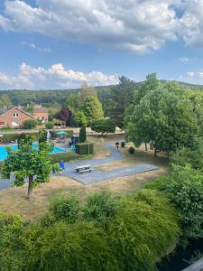 an aerial view of a park with a swimming pool at Studio Cosy 2 in Han-sur-Lesse