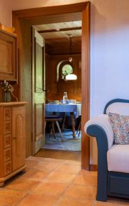 a view of a dining room with a table at Landhaus No 12 mit privater Sauna in Bayrischzell