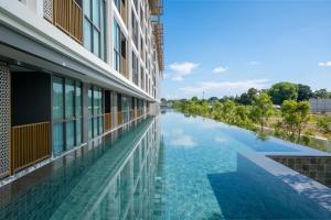 a view of a river from the side of a building at Ozon condo Family apartment in Phuket