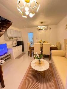 a living room with a couch and a table at Zensean Haven in General Santos