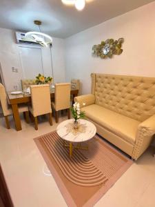 a living room with a couch and a table at Zensean Haven in General Santos