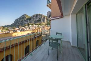 a balcony with a view of a mountain at Raggio di Sole Ulassai in Ulassai