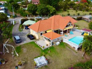 an aerial view of a house with an orange roof at VILLA PASKEDRA in Case-Pilote