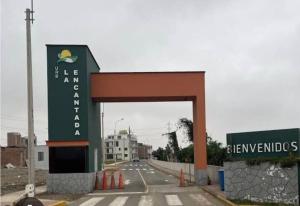 a highway with a large arch in the middle at Casa La Torre in Lurín