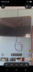 a view of a television screen with the control panel at Francolini dptos in La Banda