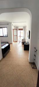 a large living room with a large tile floor at kabila vista Z1 2 chambres in M'diq +48 photos