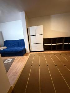 an empty room with a bed and a mattress at Loret in Kragujevac