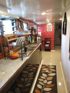 a kitchen with a sink and a counter top at Master's Homestay in Suva