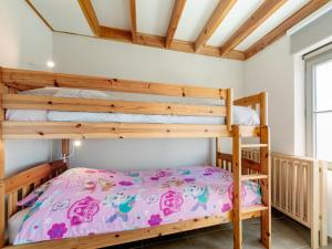 a bedroom with bunk beds in a house at Westhinder II H14 in Koksijde