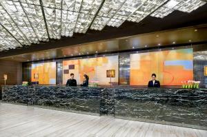 Os clientes hospedados em The Kowloon Hotel
