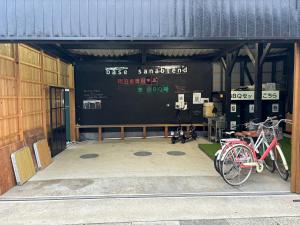 a building with two bikes parked outside of it at base sanablend - Vacation STAY 04909v in Kyotango
