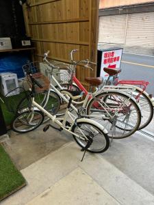 three bikes parked next to each other on a sidewalk at base sanablend - Vacation STAY 04909v in Kyotango +14 photos