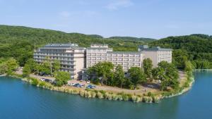 a large building on an island in the water at Hotel Abashirikoso in Abashiri