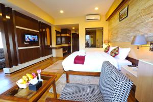 TV o dispositivi per l'intrattenimento presso Hotel Queens Park