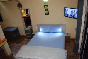 Postel nebo postele na pokoji v ubytování Baywatch Apartment