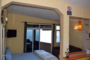 Postel nebo postele na pokoji v ubytování Baywatch Apartment