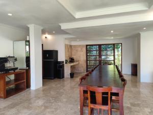 a large dining room with a table and chairs at Villa Diana Bali 14 Bedrooms in Seminyak
