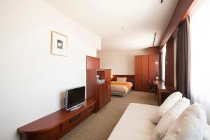 Sjónvarps- og/eða afþreyingartæki á Hotel Granmirage