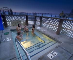a group of people in a swimming pool at Edgewater Hotel and Waterpark in Duluth +37 photos
