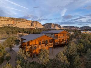 an aerial view of a home with mountains in the background at Copper Rock Ridge- Luxury, Pool Table, Hot Tub between Zion and Bryce in Orderville