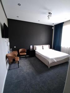 Lova arba lovos apgyvendinimo įstaigoje Comfort hotel