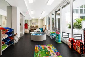 a childs play room with a lego store at Habitat Residence in Miami
