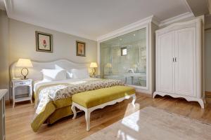 מיטה או מיטות בחדר ב-Arena Hotel - Special Class +66 תמונות