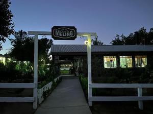 a building with a sign for a dining establishment at #5 Rancho Meling in Camalú