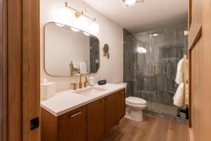 a bathroom with a sink and a shower at Switchback at Edelweiss in Whitefish